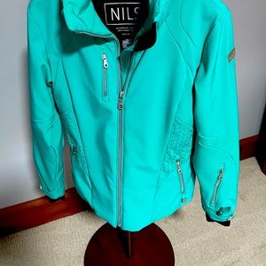 Plenty of ski season left, go in style with woman only brand of ski jacket!